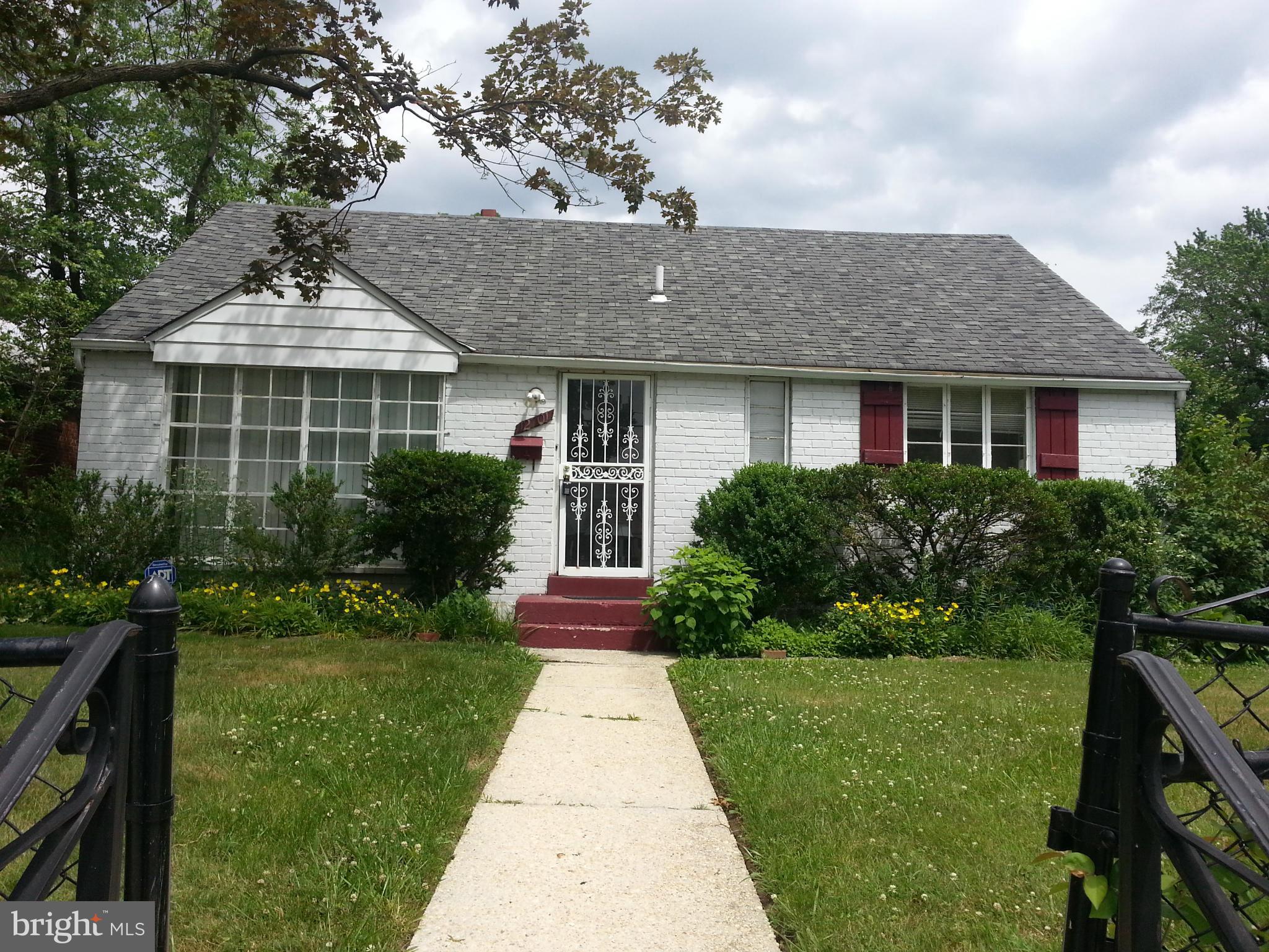 12701 Gould Road Silver Spring, MD 20906 - Photo 2 of 30 a front view of a house with a yard