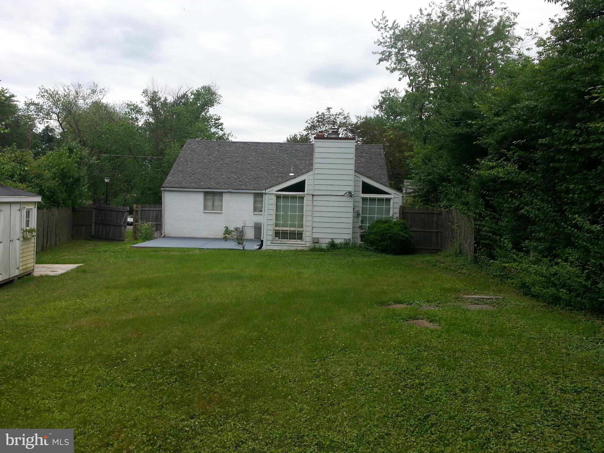 12701 Gould Road Silver Spring, MD 20906 - Photo 21 of 30 a front view of house with yard and green space