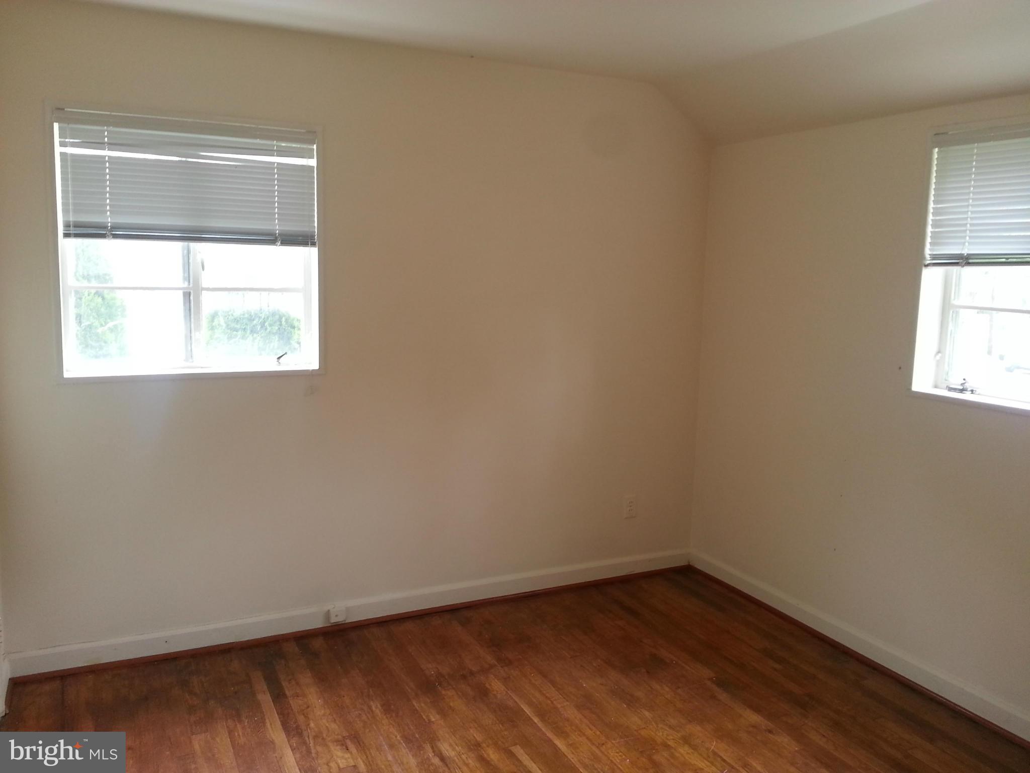 12701 Gould Road Silver Spring, MD 20906 - Photo 10 of 30 an empty room with a window