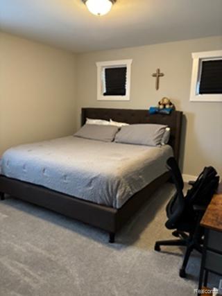 2500 Walnut View Drive Howell, MI 48855 - Photo 21 of 41 Bedroom with light colored carpet