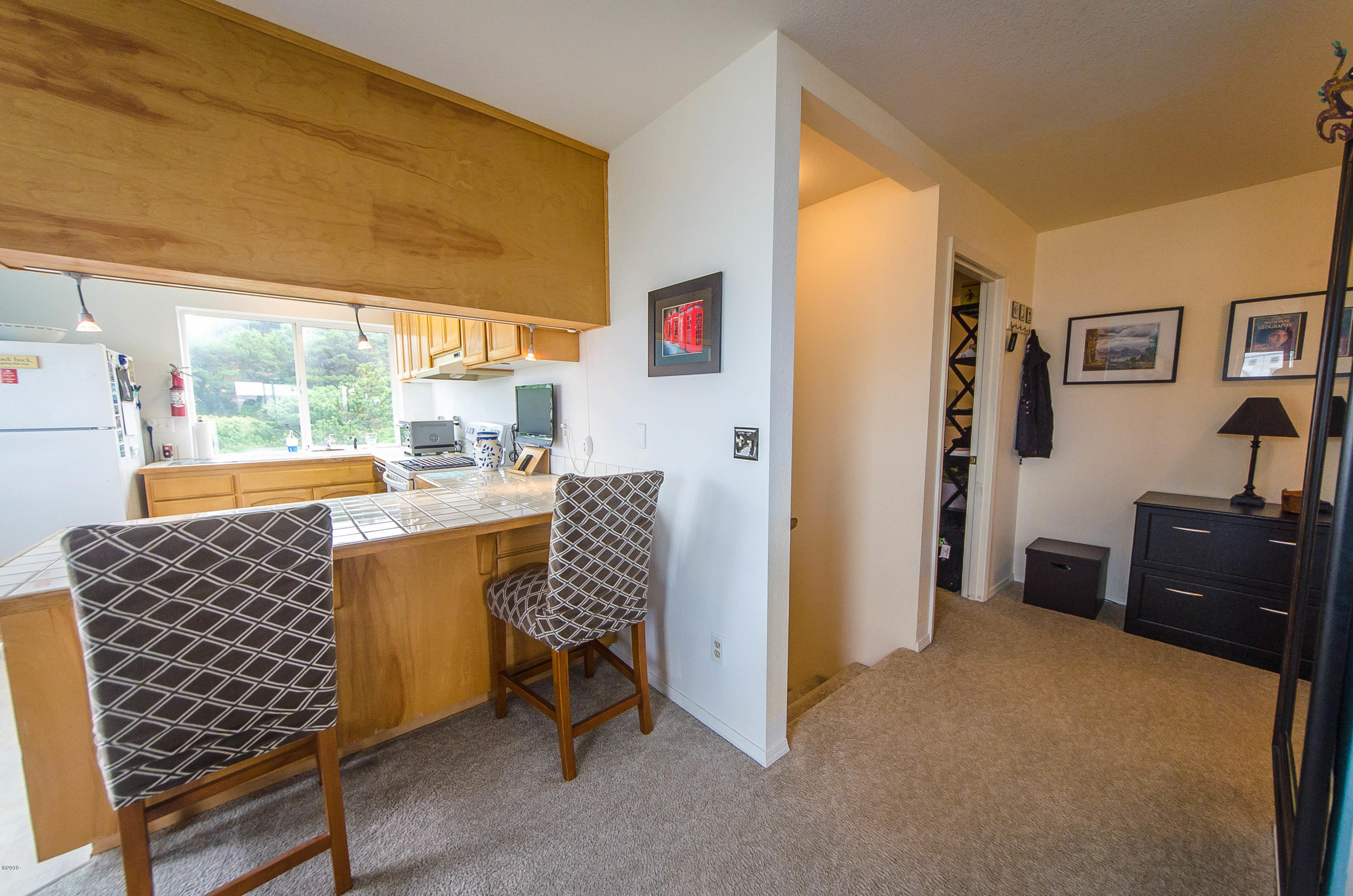 568 Southwest 5th Street Newport, OR 97365 - Photo 5 of 20 14 Unit 2 Kitchen and Hallway