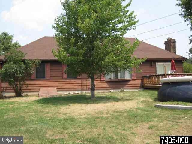 263 White Hall Road Littlestown, PA 17340 - Photo 2 of 16 a front view of a house with a yard