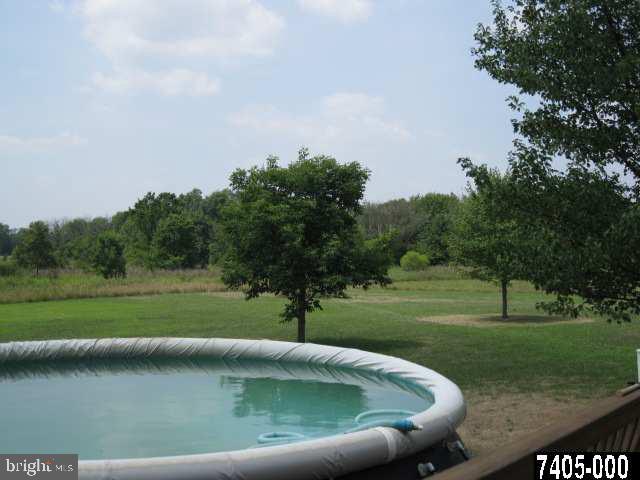 263 White Hall Road Littlestown, PA 17340 - Photo 5 of 16 a view of a golf course with a lake