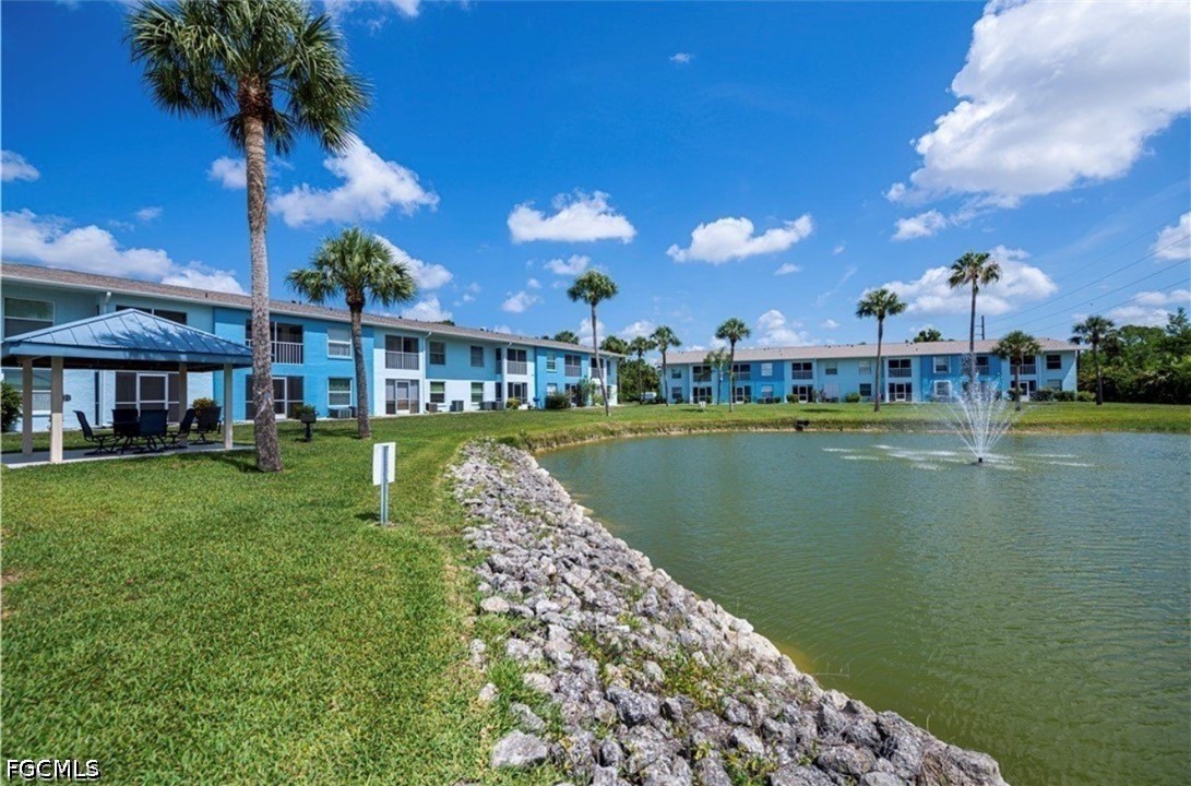1100 Pondella Road, Unit 703 Cape Coral, FL 33909 - Photo 3 of 16 a view of a house with a lake view