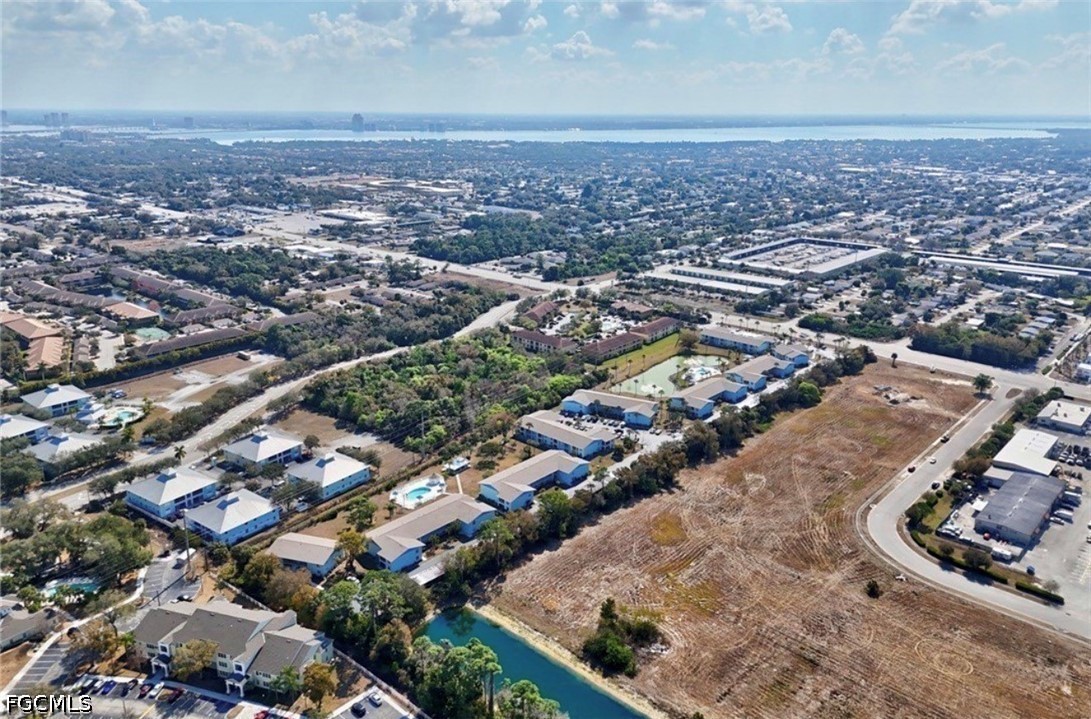 1100 Pondella Road, Unit 703 Cape Coral, FL 33909 - Photo 7 of 16 an aerial view of multiple house