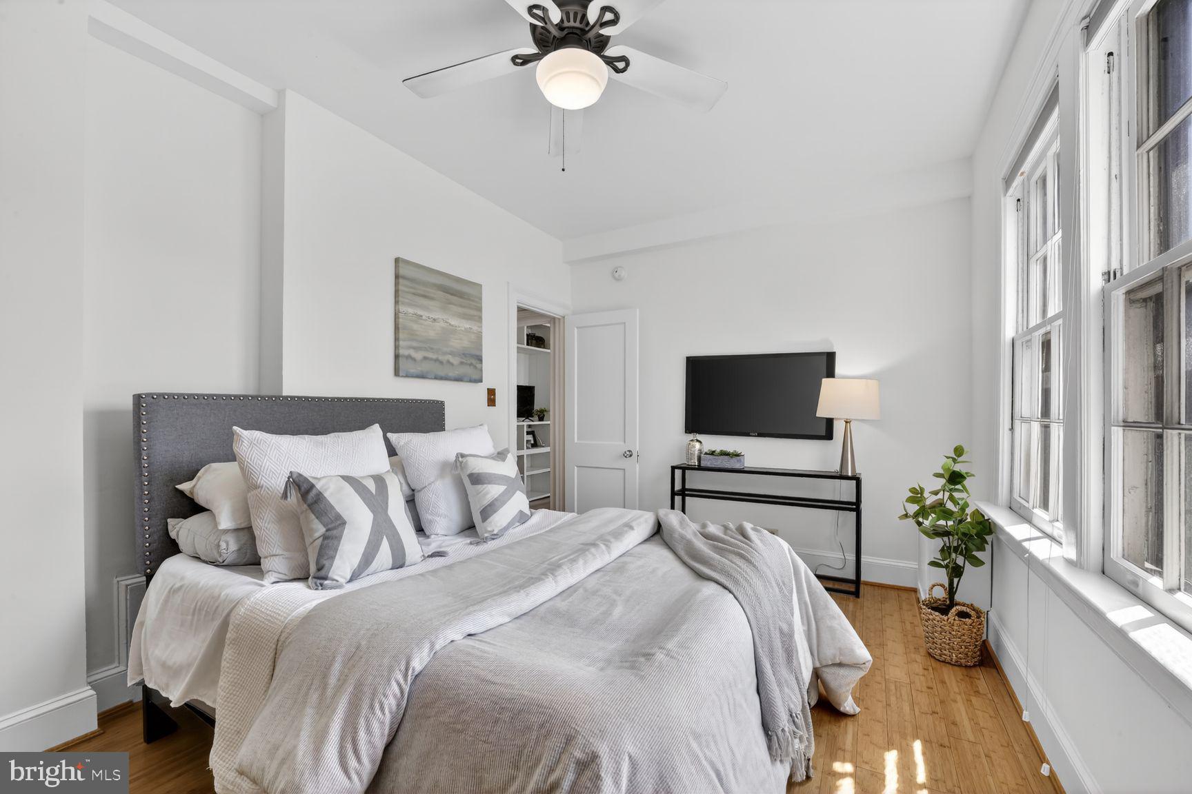 2707 Adams Mill Road Northwest, Unit 400 Washington, DC 20009 - Photo 21 of 21 Serene bedroom with natural light.