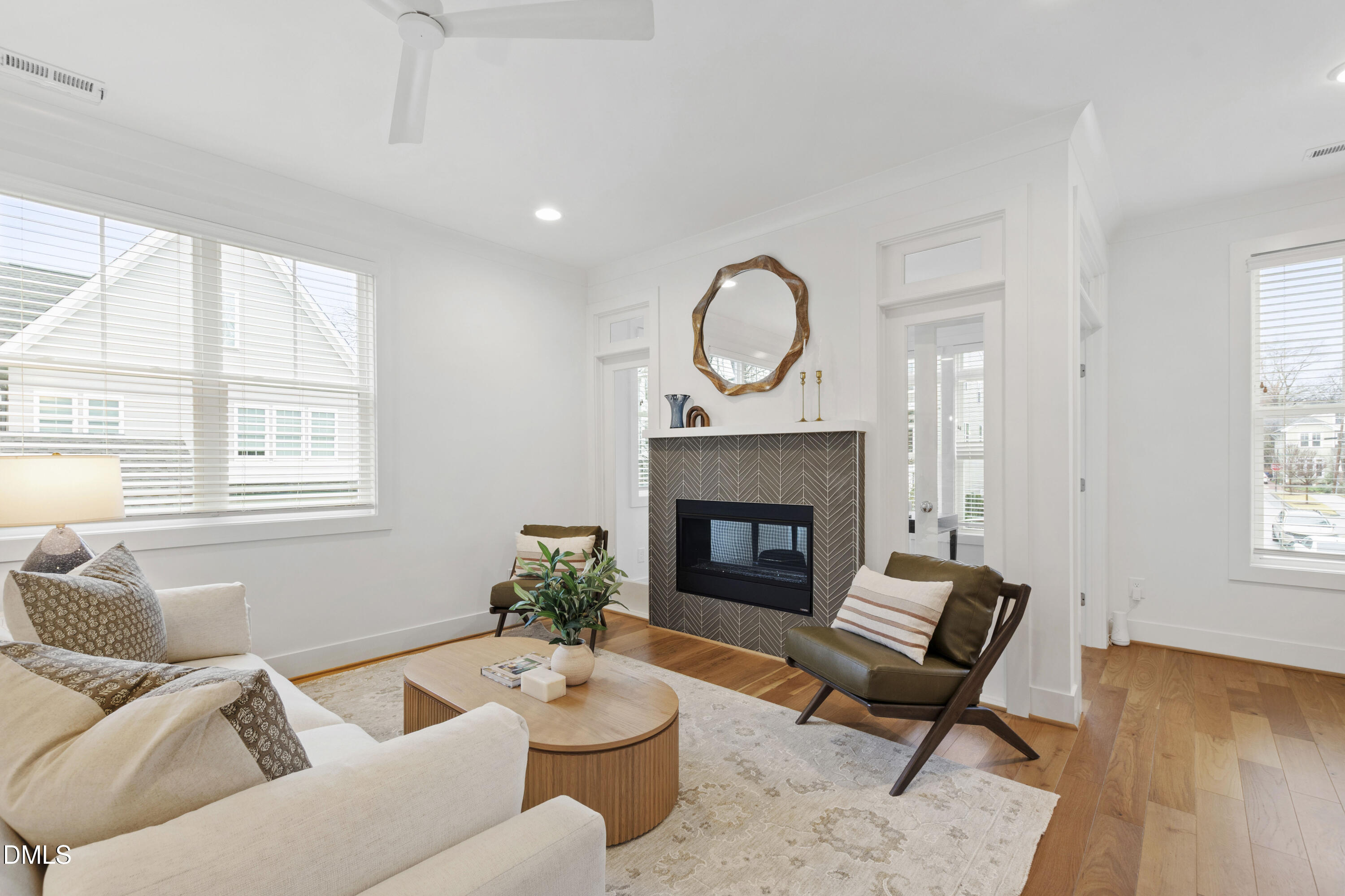 718 Peakland Place Raleigh, NC 27604 - Photo 17 of 48 a living room with furniture and a fireplace