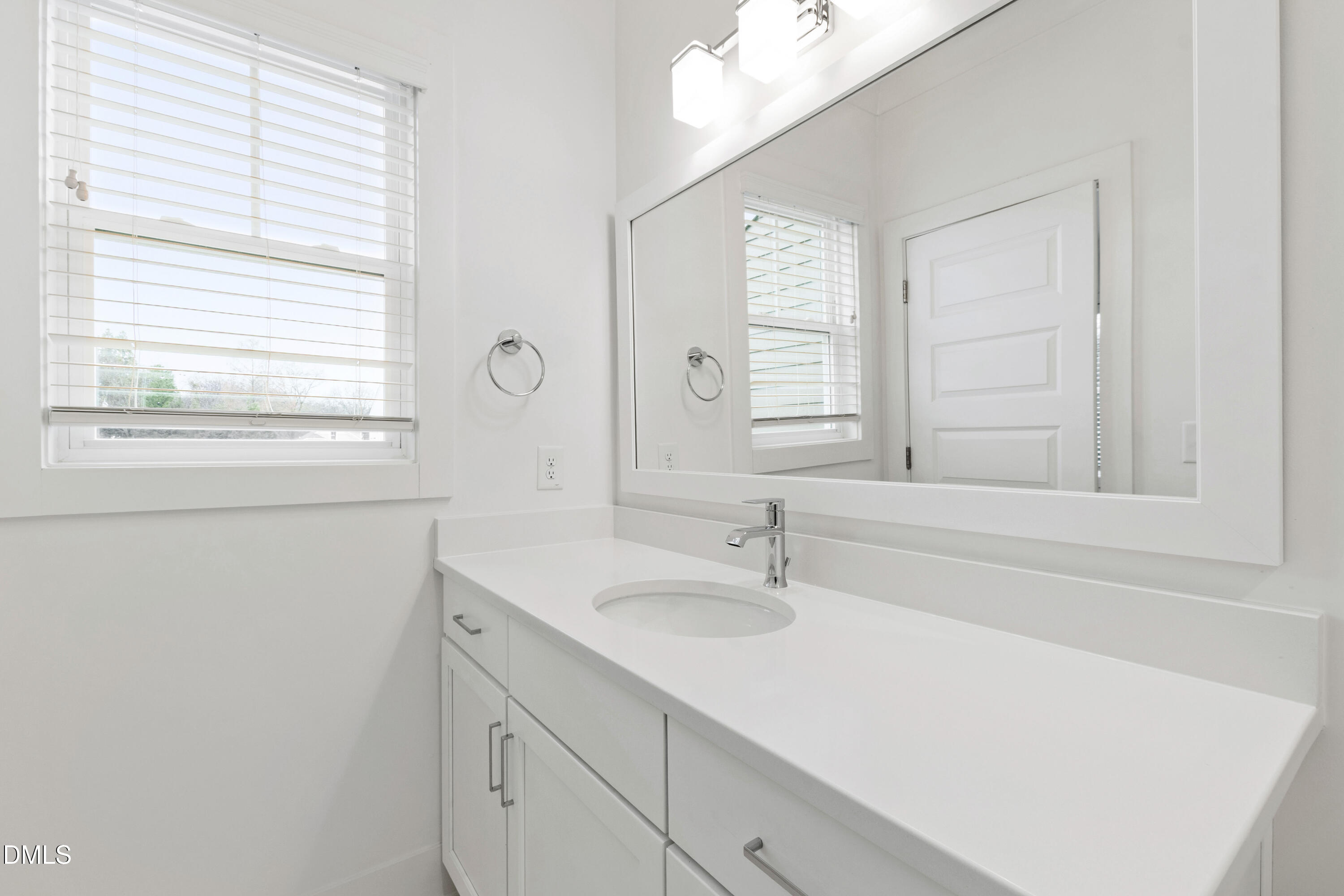 718 Peakland Place Raleigh, NC 27604 - Photo 37 of 48 a bathroom with a sink and a bathtub