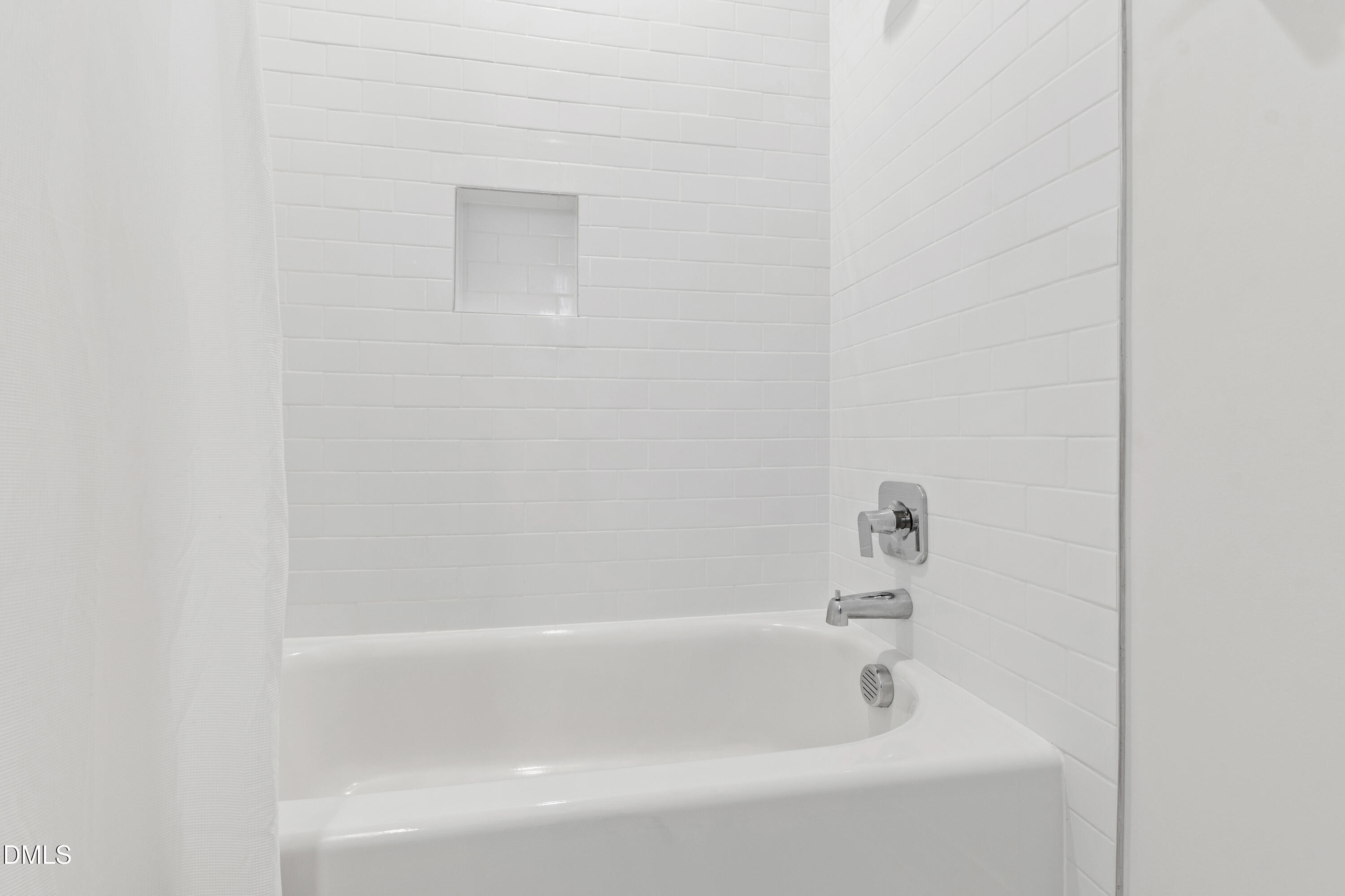 718 Peakland Place Raleigh, NC 27604 - Photo 38 of 48 a close up of a bathtub