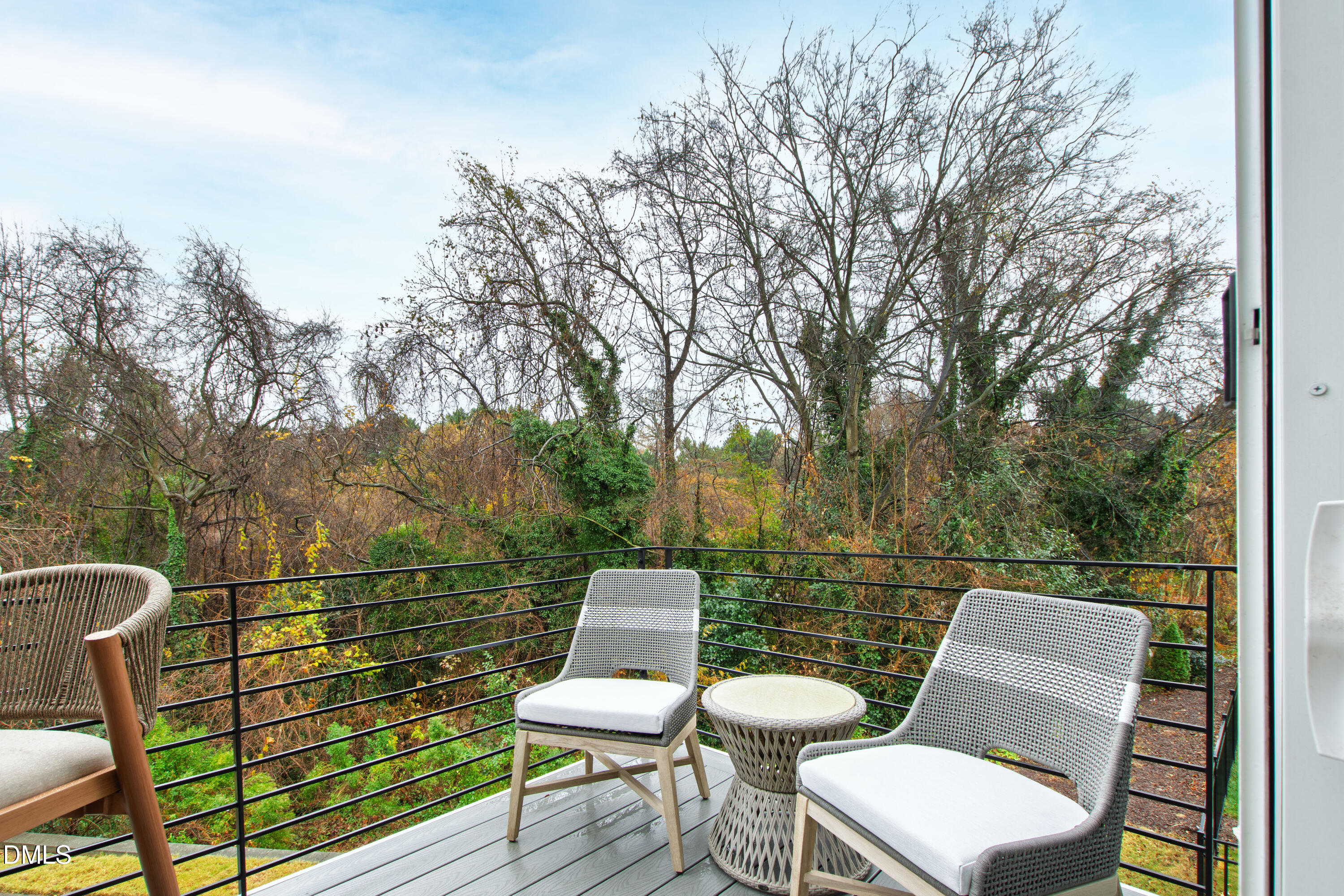 718 Peakland Place Raleigh, NC 27604 - Photo 6 of 48 a view of a chairs in a deck
