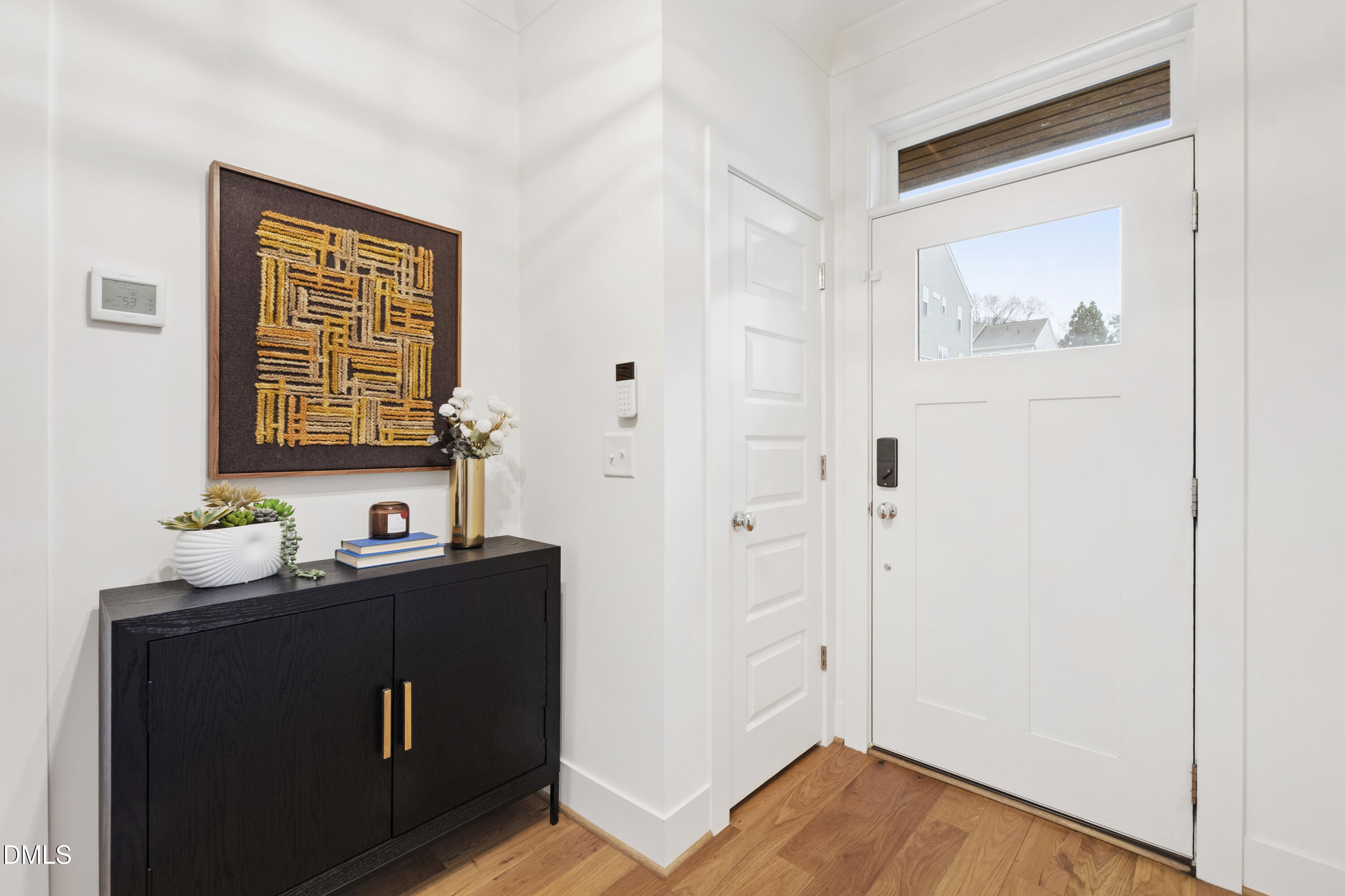 718 Peakland Place Raleigh, NC 27604 - Photo 8 of 48 a view of a hallway with workspace