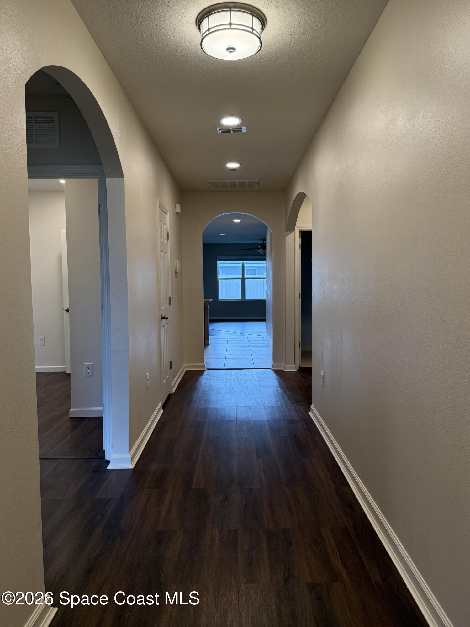1070 Swiss Pointe Lane Rockledge, FL 32955 - Photo 3 of 18 a view of gallery with wooden floor