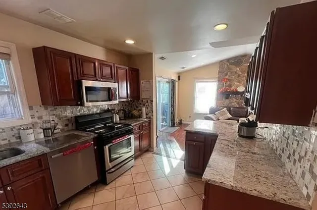 a living room with furniture and a couch