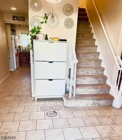 a bedroom with bed and window