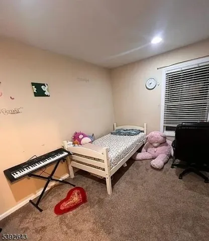 a aerial view of a house with a yard