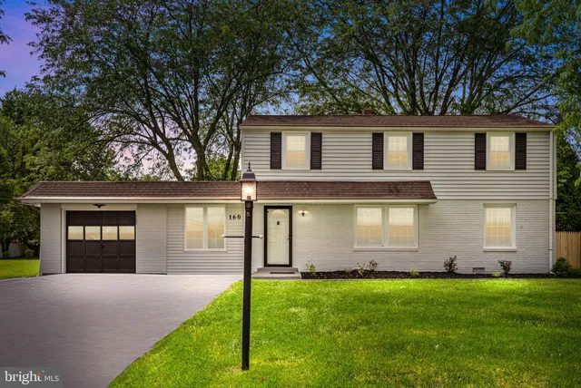 a front view of house with yard