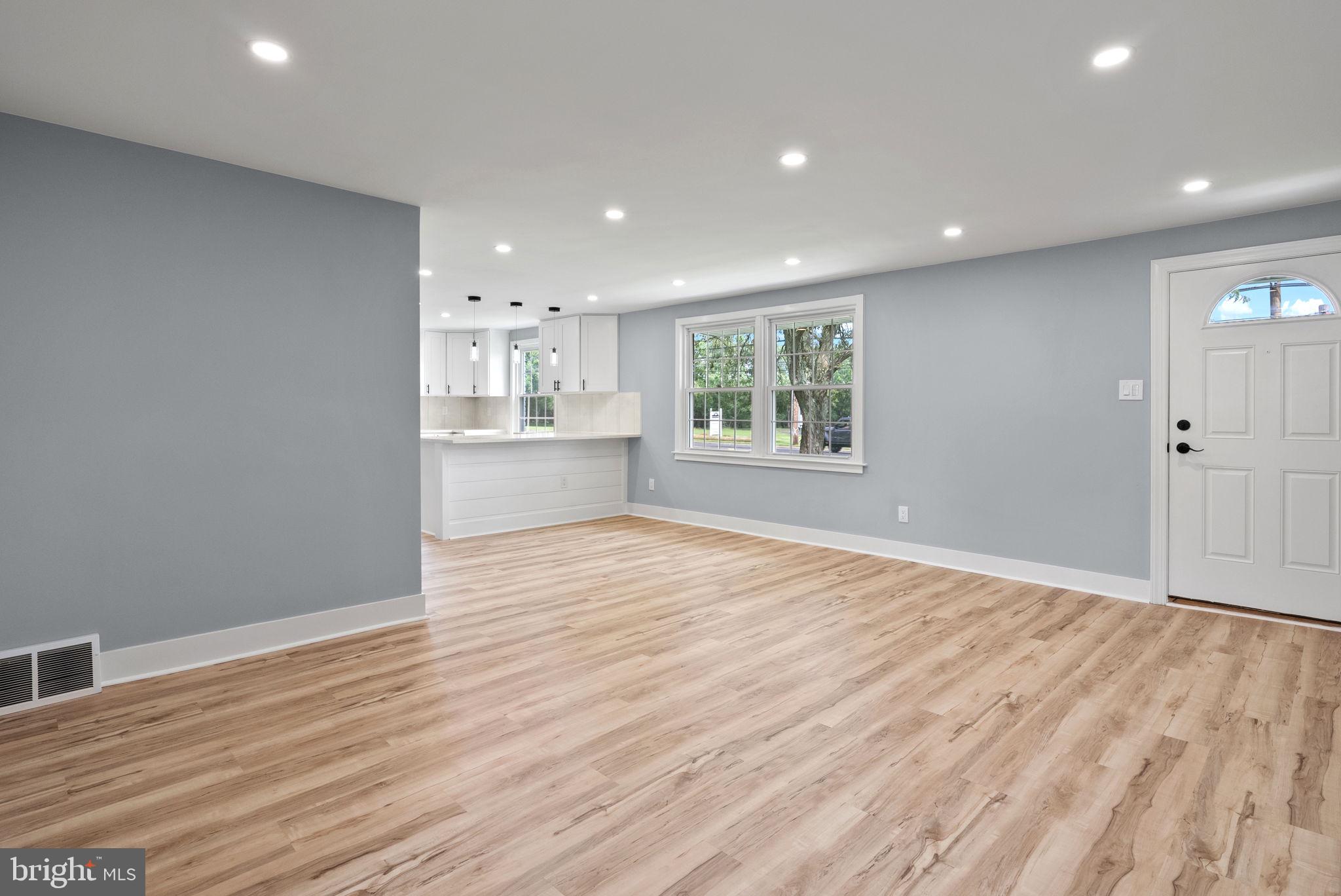 160 Church Road North Wales, PA 19454 - Photo 13 of 36 an empty room with wooden floor and windows