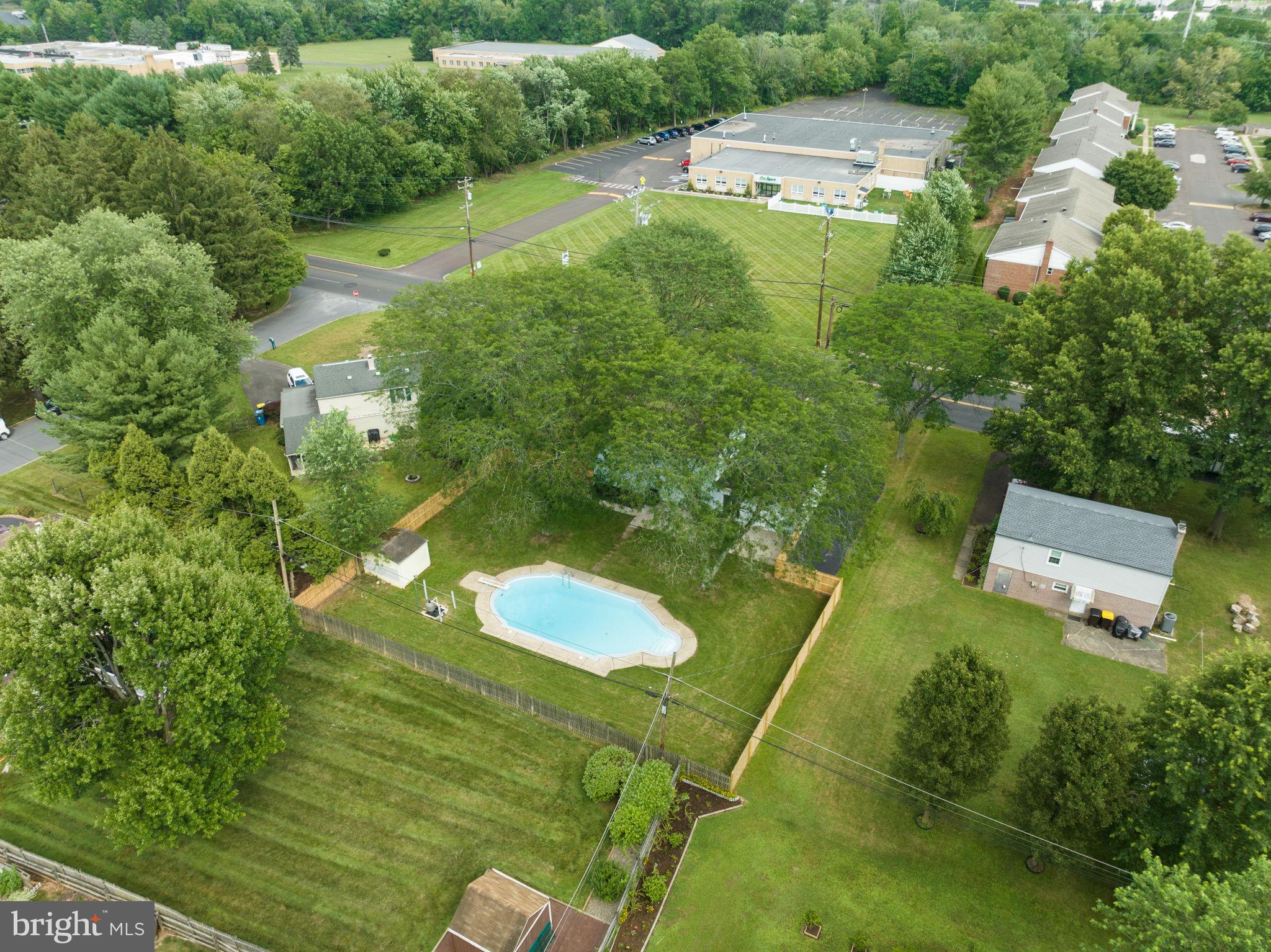 160 Church Road North Wales, PA 19454 - Photo 3 of 36 an aerial view of a house with a yard