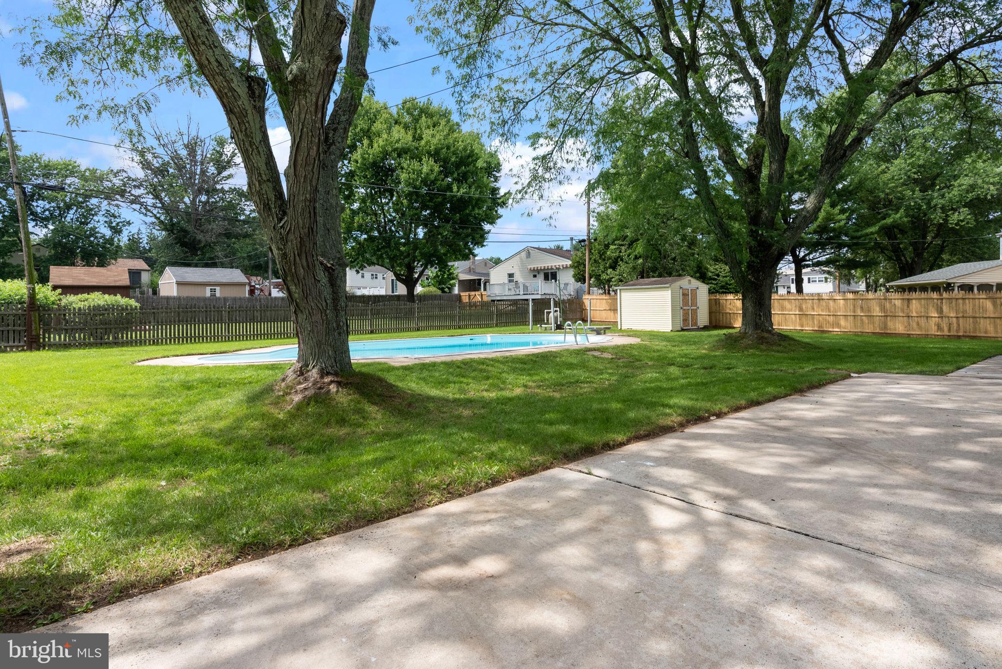 160 Church Road North Wales, PA 19454 - Photo 9 of 36 a view of a yard with a trees