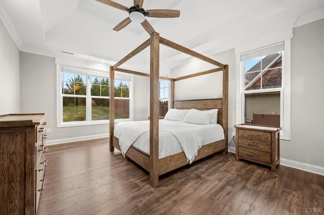 an aerial view of a house with a lake view