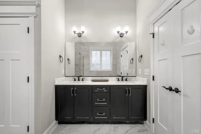 a room with furniture and large windows