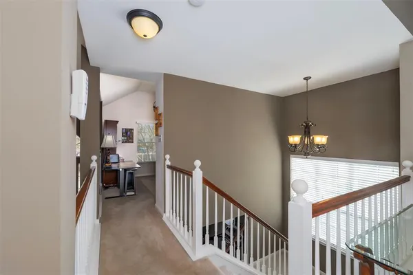 a view of a workspace with furniture