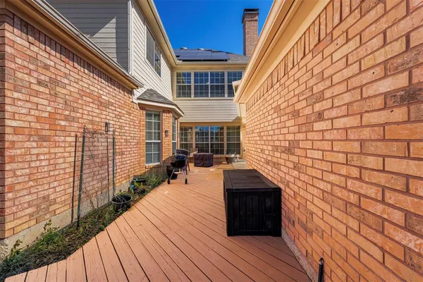 a view of park with large trees