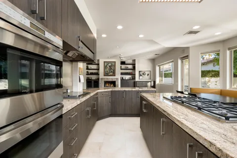 a view of a swimming pool with a yard