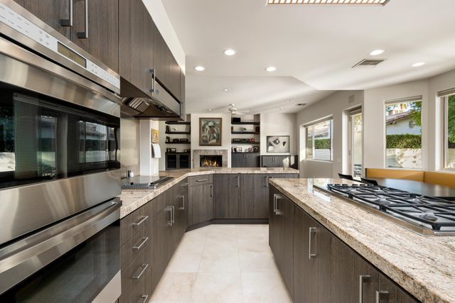 a view of a swimming pool with a yard