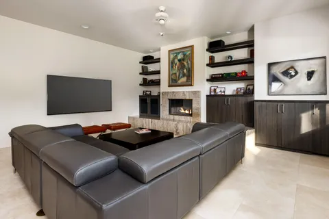 a view of a garden with a building in the background