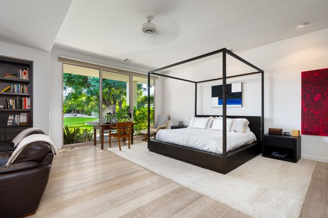 a view of a house with a swimming pool