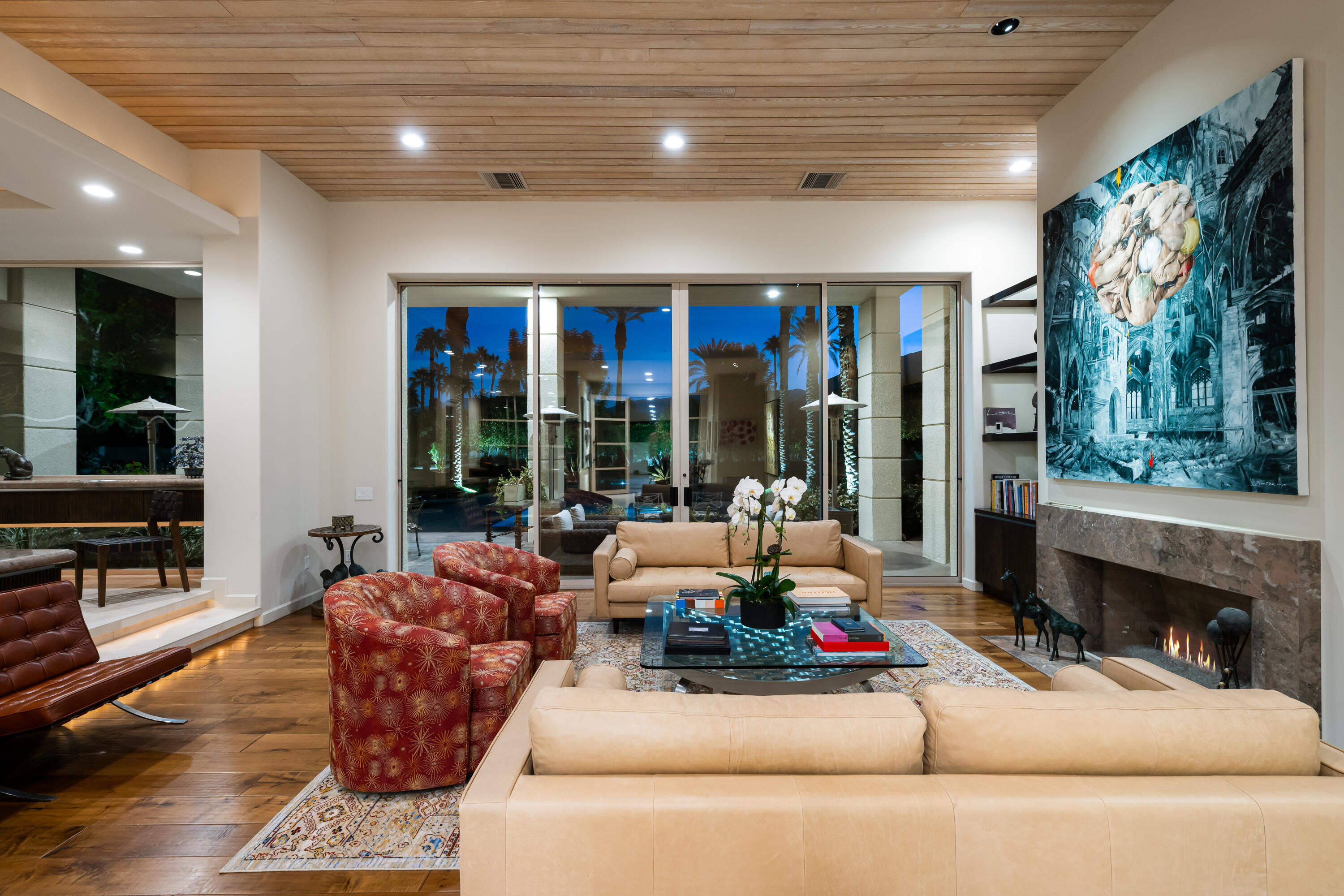 40745 Morningstar Road Rancho Mirage, CA 92270 - Photo 68 of 72 a living room with furniture fireplace and flat screen tv
