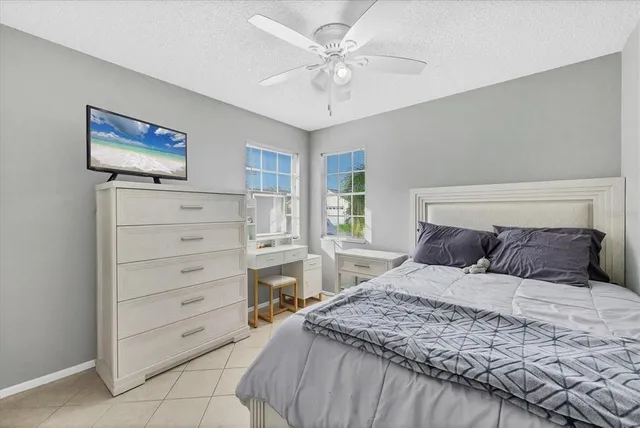 a bedroom with a bed and a closet