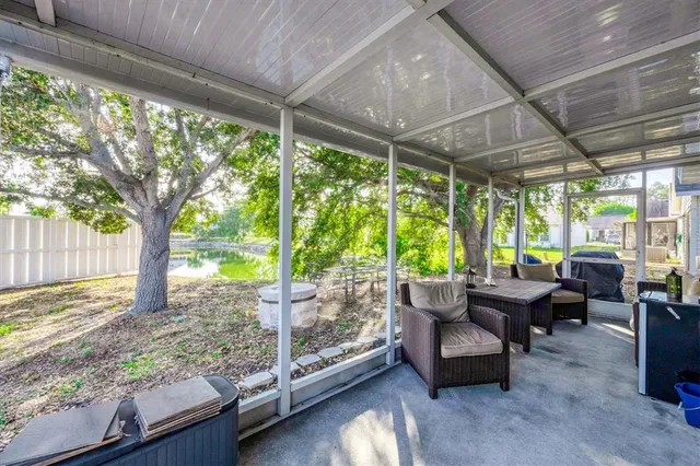 a outdoor living space with furniture and garden view