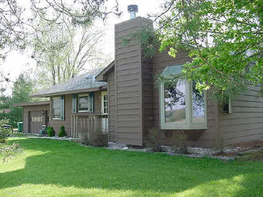 11114 Harrison Road Rockton, IL 61072 - Photo 1 of 5 a view of a house with a yard