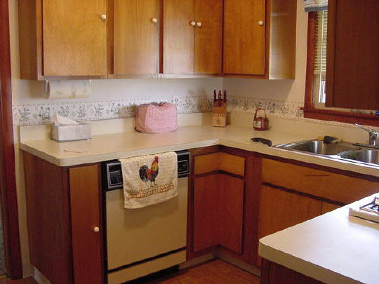 11114 Harrison Road Rockton, IL 61072 - Photo 5 of 5 a kitchen with stainless steel appliances granite countertop a sink stove and cabinets