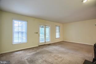 2047 F Raleigh Road Hummelstown, PA 17036 - Photo 13 of 35 Living Room Leads to Private Patio