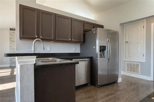 a utility room with washing machine