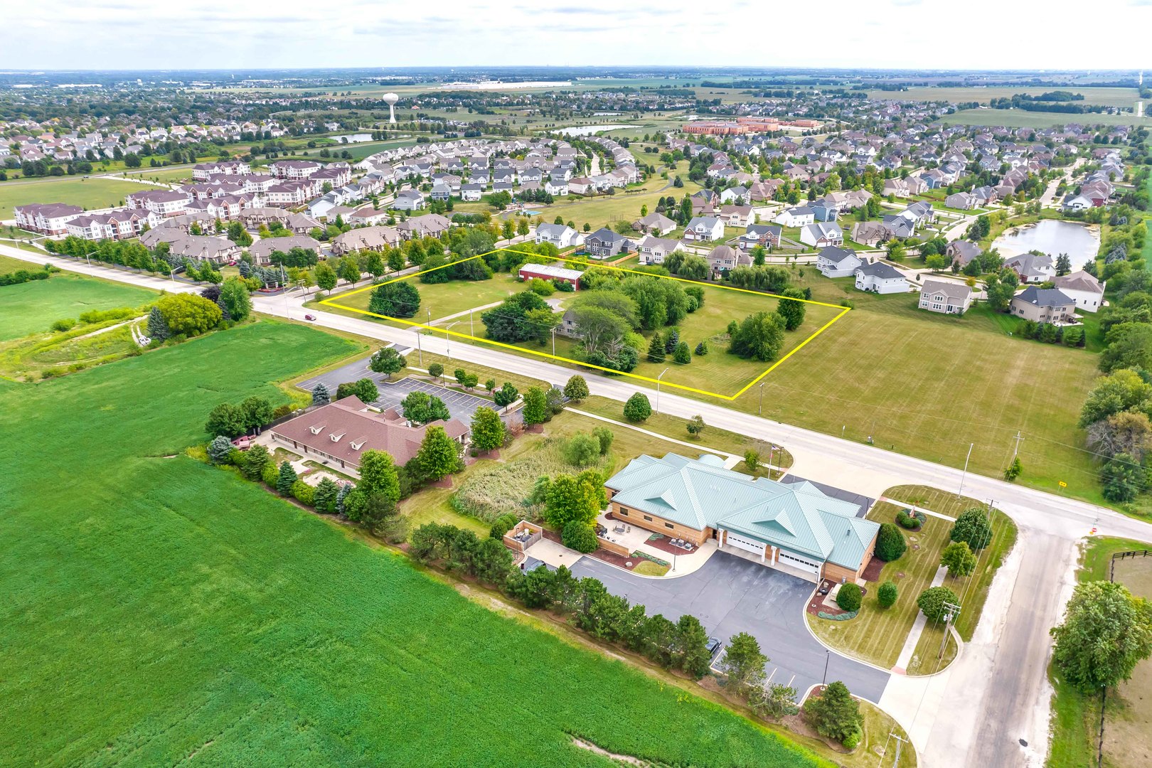 870 Simons Road Plainfield, IL 60585 - Photo 14 of 14 an aerial view of a city with mountains