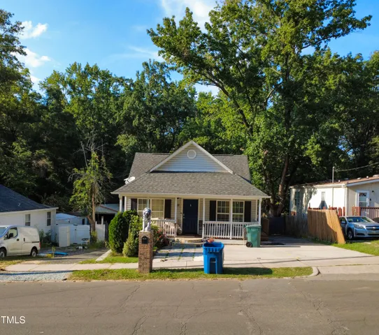 a house view with sitting space and garden space