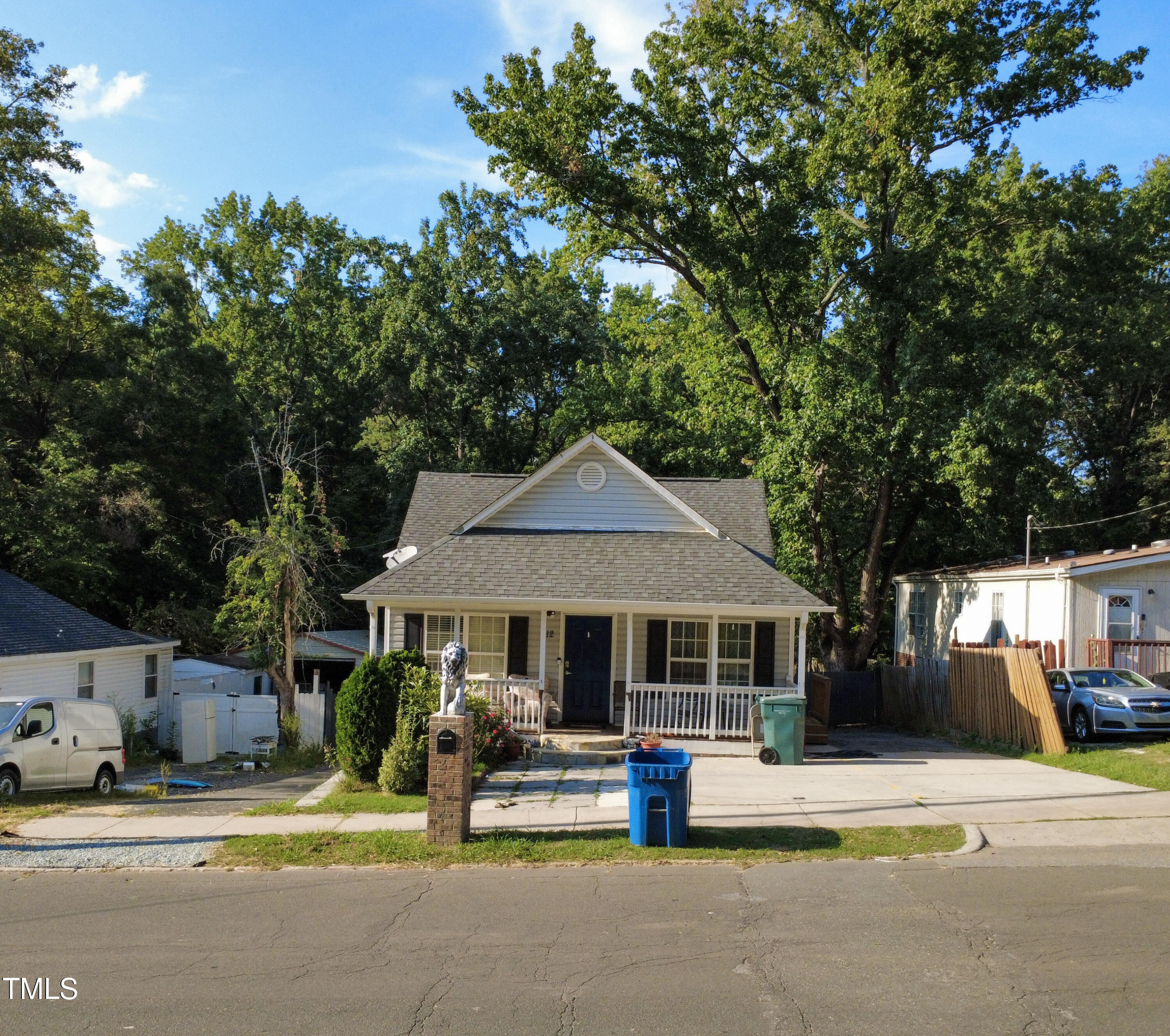 a house view with sitting space and garden space