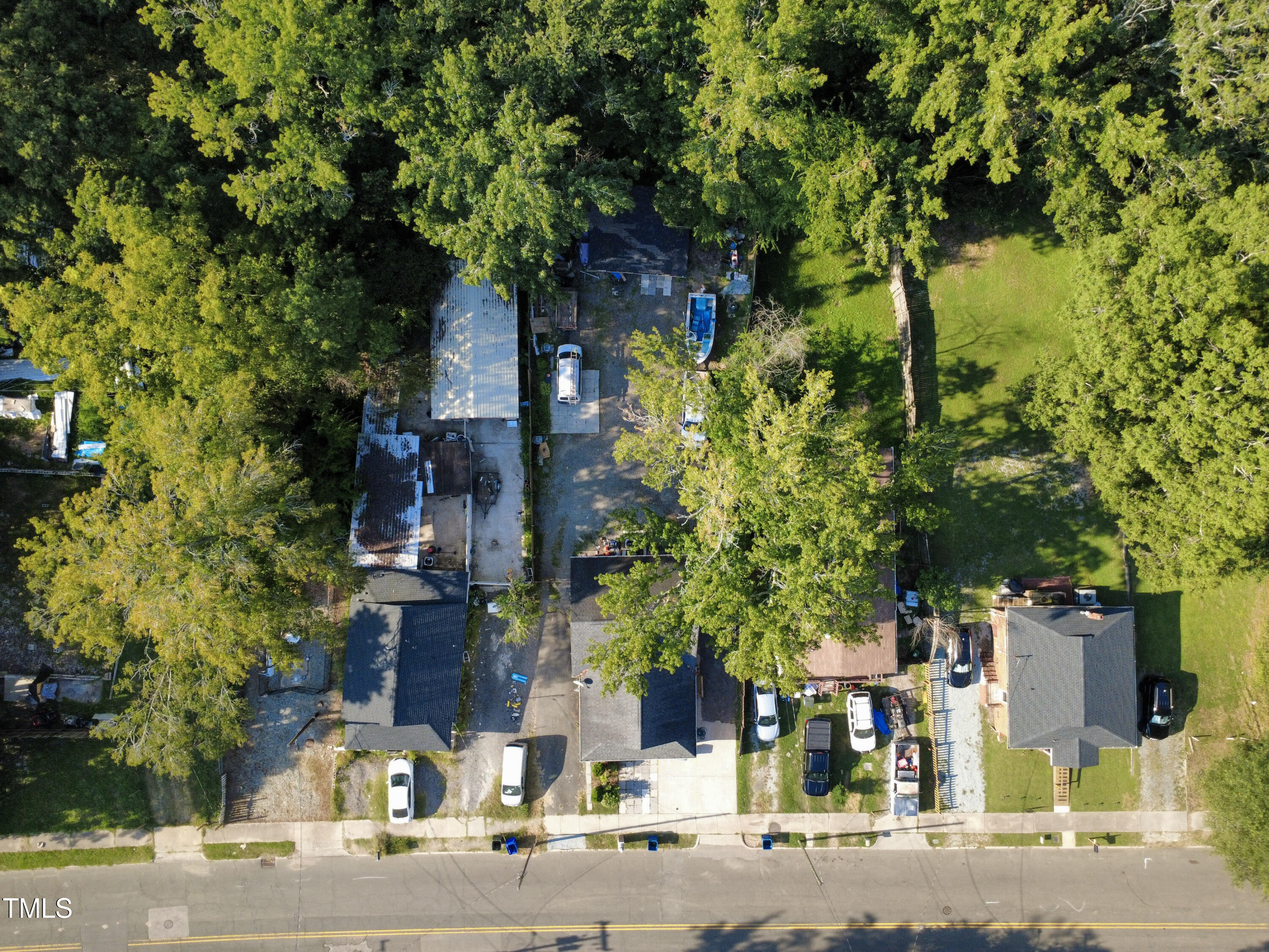 312 East End Avenue Durham, NC 27703 - Photo 16 of 18 a front view of a house with a yard and tree s