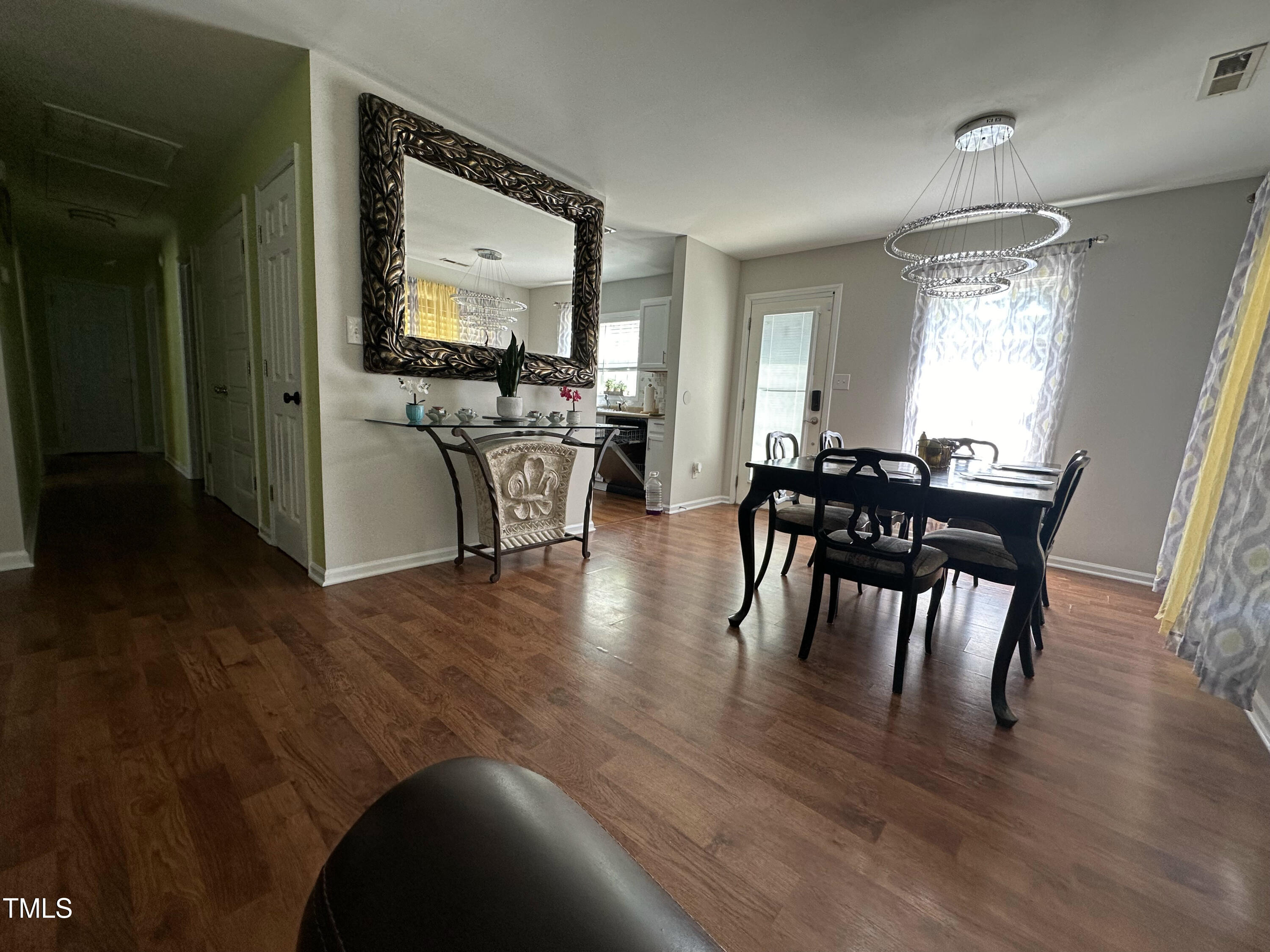 312 East End Avenue Durham, NC 27703 - Photo 5 of 18 a view of a dining room with furniture window and wooden floor