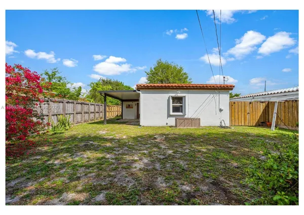 a view of a backyard with a garden