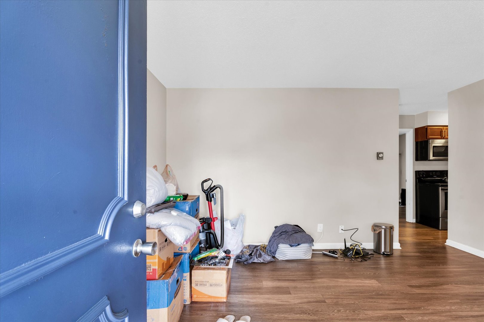 309 West Springfield Avenue Urbana, IL 61801 - Photo 18 of 35 a room with gym equipment and view of living room
