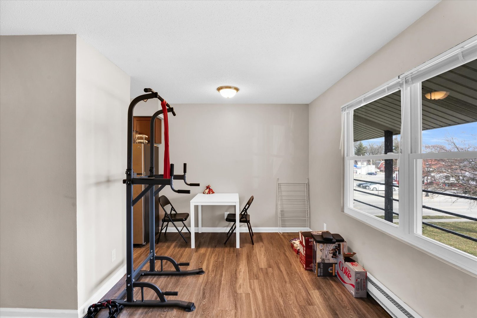309 West Springfield Avenue Urbana, IL 61801 - Photo 20 of 35 a view of a room with furniture wooden floor and a window