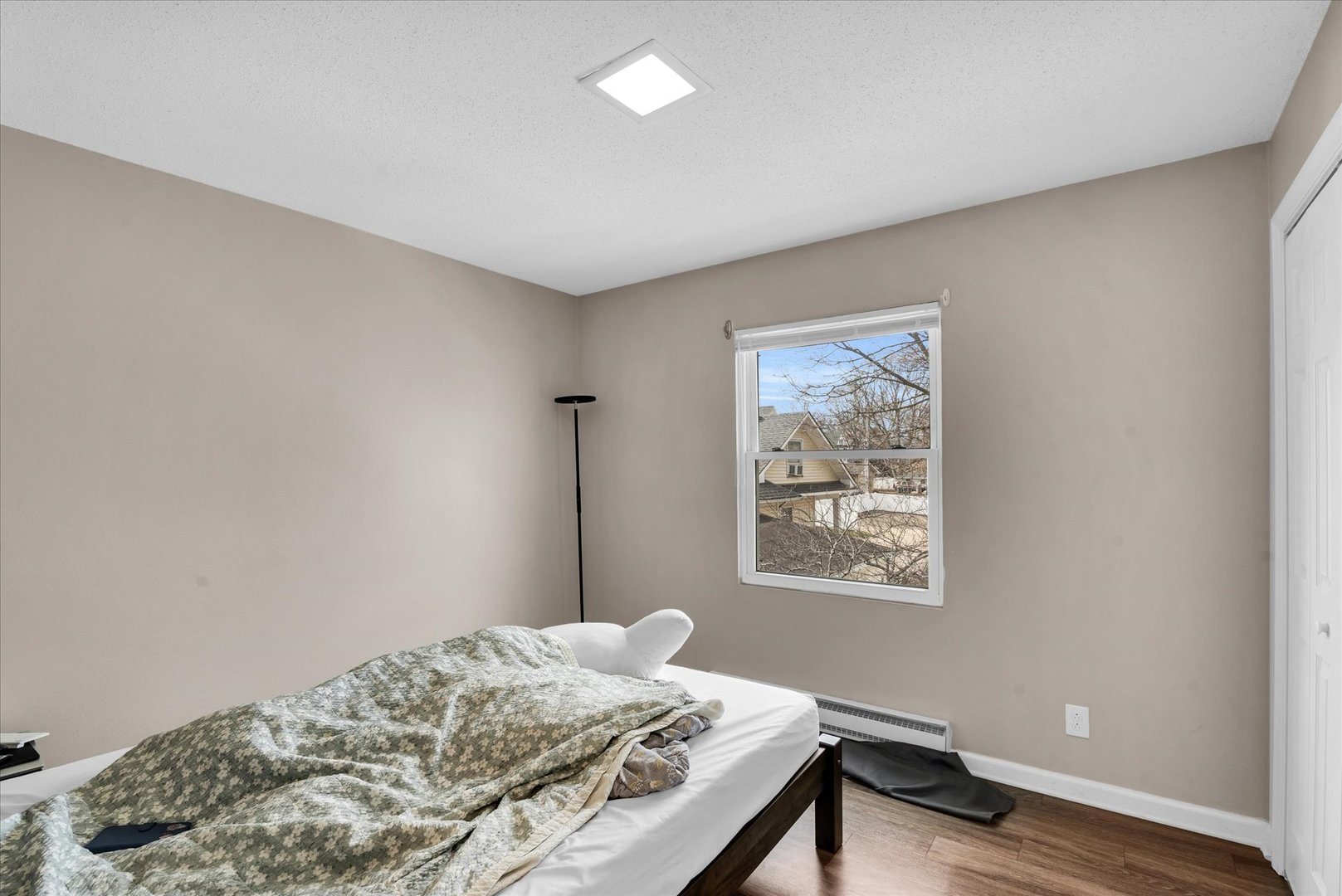 309 West Springfield Avenue Urbana, IL 61801 - Photo 28 of 35 a bedroom with a bed and a window