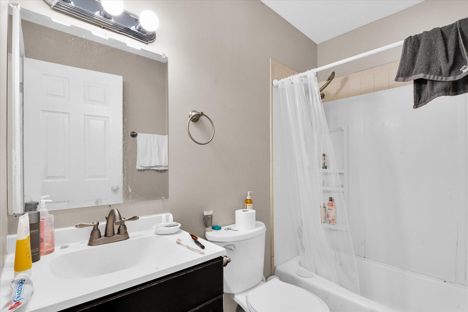 309 West Springfield Avenue Urbana, IL 61801 - Photo 29 of 35 a bathroom with a sink toilet and shower