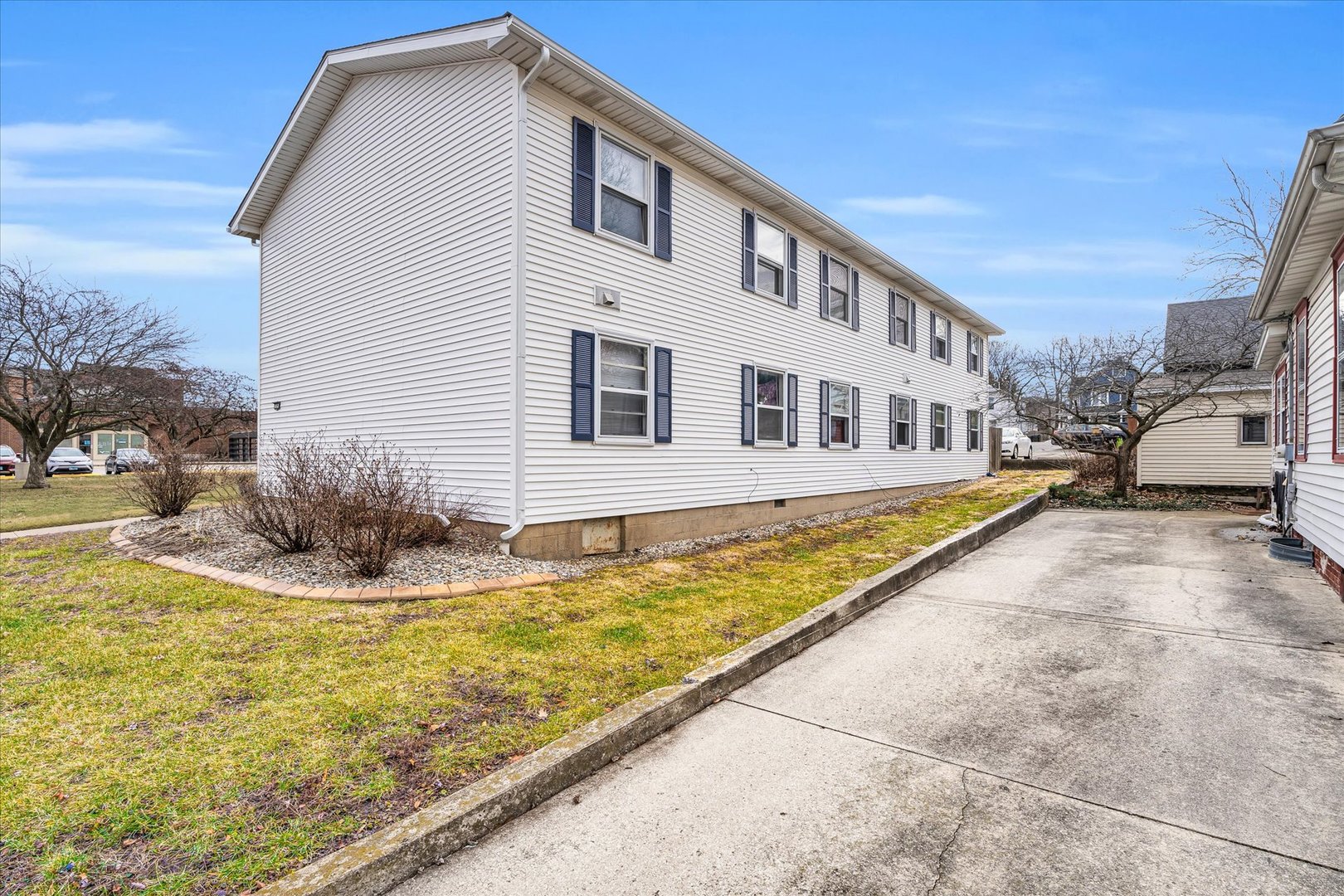 309 West Springfield Avenue Urbana, IL 61801 - Photo 32 of 35 a view of swimming pool with outdoor seating and yard