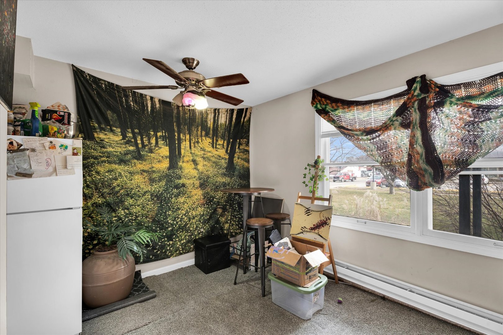 309 West Springfield Avenue Urbana, IL 61801 - Photo 9 of 35 a bedroom with furniture and a chandelier